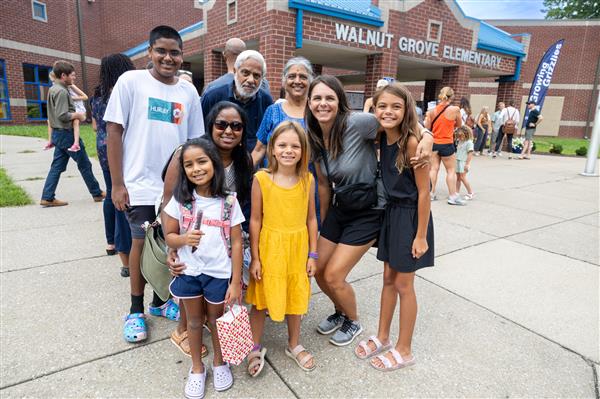 large group of parents, grandparents and students